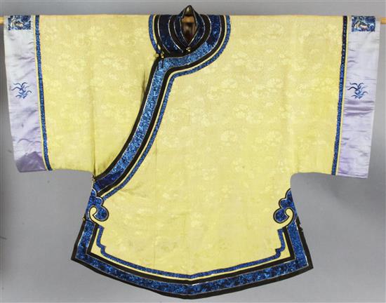 A Chinese yellow brocade jacket,